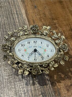 Linden Gold Floral Oval Wall Clock with White Dial
